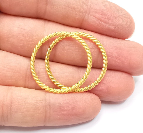 Orecchini A Cerchio Intrecciati Da 30 Mm Placcati Oro Rosa: Il Tocco Chic Per Ogni Occasione