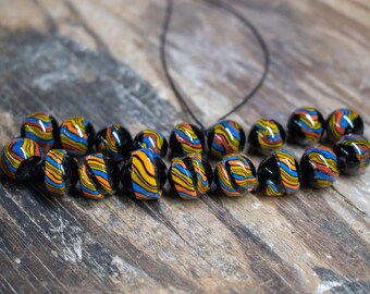 Tradecloth Wrapped Round Stringer Beads