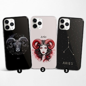 May include: Three phone cases with Aries zodiac designs. One case is black with a ram illustration, another is light pink with a woman and red horns, and the third is black with a constellation and the word "Aries".