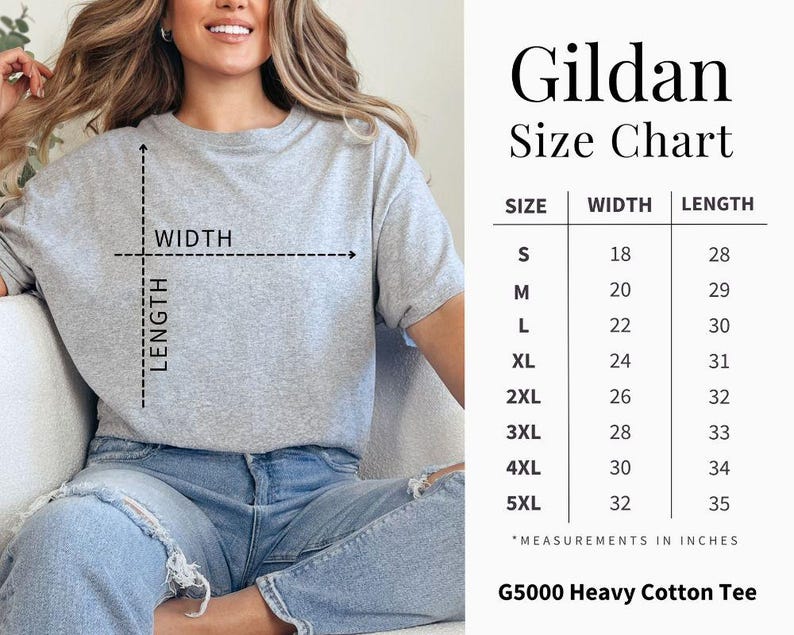 May include: A light grey Gildan G5000 heavy cotton tee shirt. The image includes a size chart with measurements in inches for sizes S to 5XL. The shirt is shown on a person wearing blue jeans.