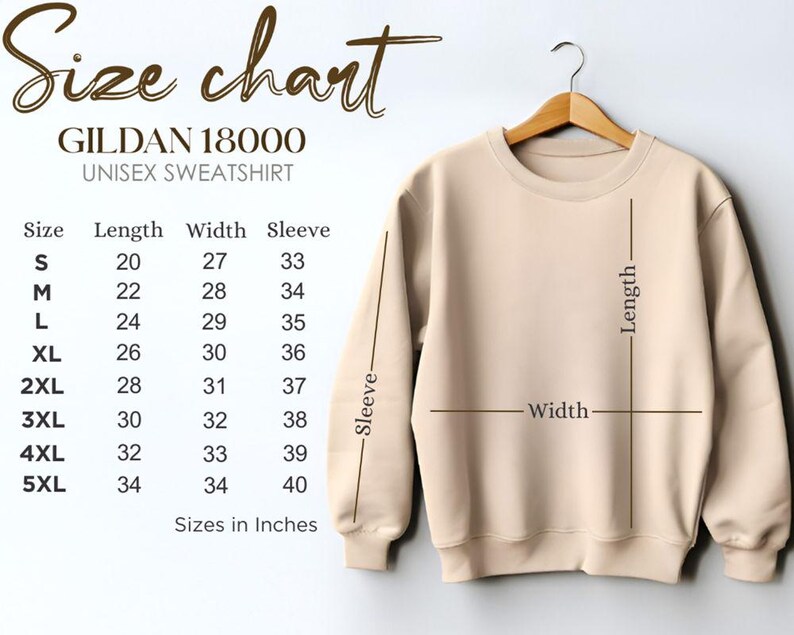 May include: A beige Gildan 18000 unisex sweatshirt hangs on a wooden hanger. A size chart shows measurements in inches for sizes S to 5XL, including length, width, and sleeve dimensions. The chart is labeled "Size chart".