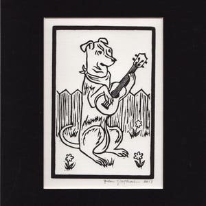 Dog Playing Ukulele Matted Linocut Hand Printed Hand Carved Black & White
