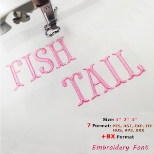 May include: Pink embroidered text on white fabric reads "FISH TAIL." The text is in a decorative font. The image also includes the text "Size: 2.5cm 5cm 7.6cm" and "Embroidery Font."