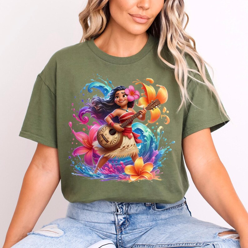May include: Olive green t-shirt featuring a vibrant graphic of a cartoon character playing a ukulele. The character is surrounded by colorful flowers and water splashes. The design includes a pink flower in the character's hair.