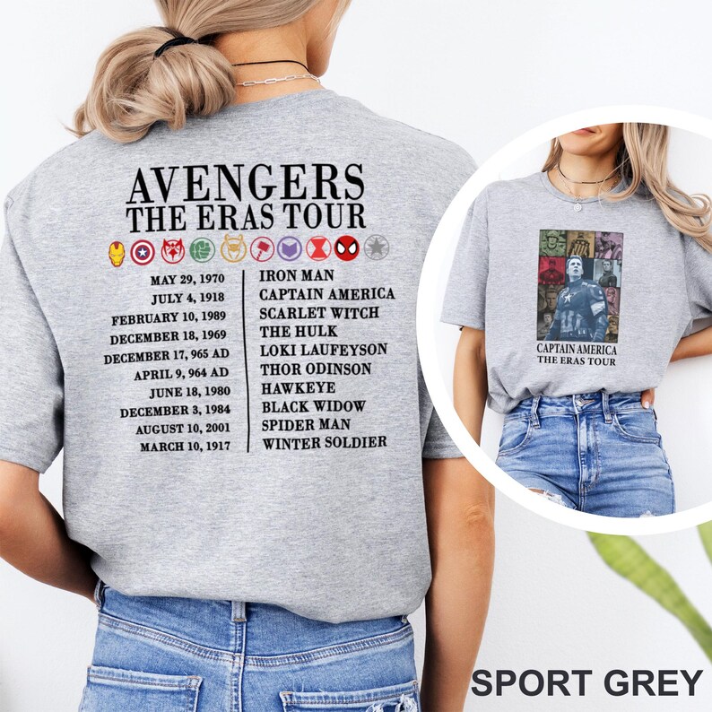 May include: Sport grey t-shirt with the text "AVENGERS THE ERAS TOUR" and a list of dates and characters. The front of the shirt has a Captain America graphic. The shirt is made of a soft material.