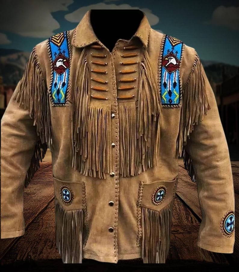 May include: A brown suede jacket with fringe detailing and beaded accents. The jacket features a Native American inspired design with eagle motifs and geometric patterns.