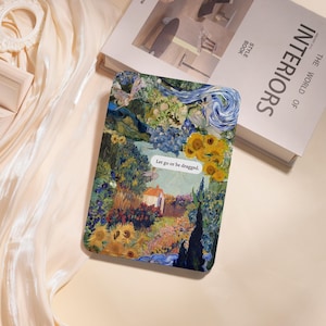May include: A rectangular case with a vibrant, impressionistic painting design. The artwork features sunflowers, a house, and swirling blue skies. The text "Let go or be dragged" is printed on a white rectangle. A book titled "INTERIORS" is in the background.