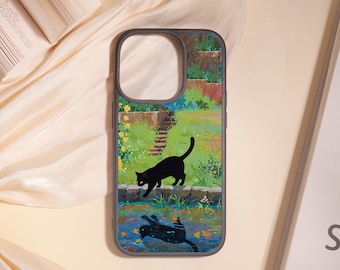 May include: A phone case featuring a black cat walking along a stone wall, with its reflection in the water below. The case has a colorful illustration of a garden scene with a staircase and flowers.