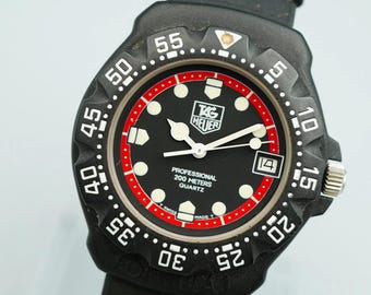 Gebraucht, aber in gutem Zustand*. Vintage TAG Heuer Formula 1 Qz Damenuhr aus den 1990er Jahren, schwarz, 28 mm.