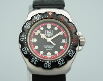Exzellenter Zustand +5* Vintage TAG Heuer Formula 1 374.508 Quarz Damenuhr aus den 1990er Jahren, schwarz, 28 mm