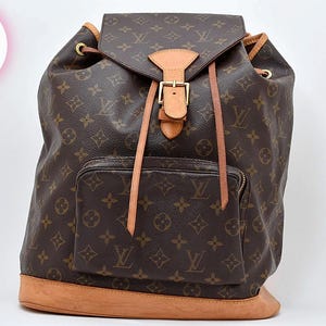 backpack louis vuitton men Chapman Brothers Navy Monogram Elephant Steamer Savonches Signed with embossed lv initials Louis Vuitton - Damier Graphite