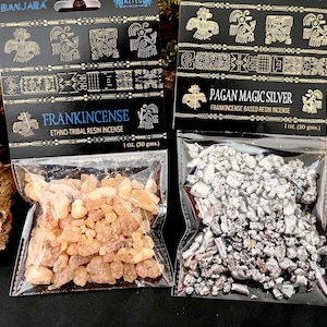 May include: Two packets of incense. One is labelled "Frankincense" and contains amber resin pieces. The other is labelled "Pagan Magic Silver" and contains silver resin pieces. Each packet is 30 gms.