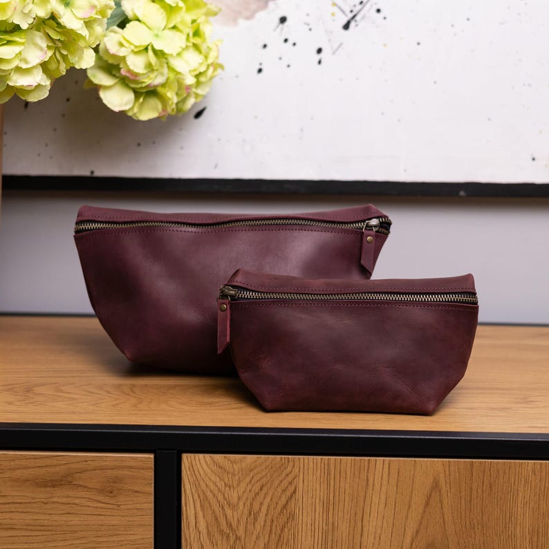 Elevate your beauty routine with our Leather Makeup Bag Personalized—a stylish and durable handmade leather makeup bag. Crafted from premium leather, it features a secure zipper and spacious design, perfect for travel. Add a monogrammed cosmetic bag touch for a unique gift. Ideal for everyday use or as a travel cosmetic case. Order now and enjoy luxury with a personal touch!