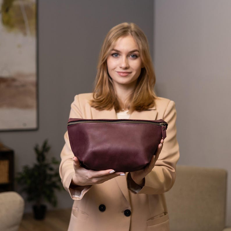 Handmade from premium leather, this monogrammed cosmetic bag is perfect for organizing your makeup and skincare. With a secure zipper and personalized touch, it’s ideal for travel or daily use. A thoughtful gift for her—stylish, compact, and durable. Customize yours today and add timeless elegance to your essentials!