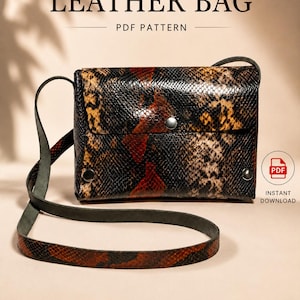 May include: A rectangular crossbody bag featuring a snakeskin pattern in shades of black, brown, and red. The bag has a flap closure with a central metal snap and two side rivets. Text reads LEATHER BAG PDF PATTERN and INSTANT DOWNLOAD.