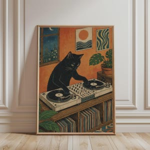 May include: A framed art print featuring a black cat standing at a DJ turntable setup. The cat is positioned in an orange room with a window showing a night cityscape, a potted plant, and two wall art pieces. Below the turntable is a record shelf.