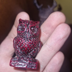 Rarissimo amuleto magico gufo in ambra rossa