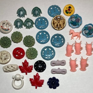 Lot of 34 Plastic Realistic Buttons Flowers, Leaves, Ship, Ropes, Butterfly, Horse, Soda’s, Star & Fruit