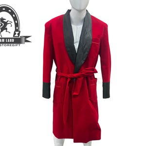 May include: A red velvet robe with a black satin shawl collar and cuffs. The robe has a matching belt and pockets. The logo "DREAM LAND ARSALSTOREGIFT" is visible in the upper left corner.