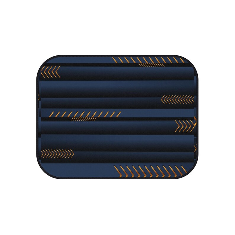 May include: A rectangular, navy blue object with rounded corners. The design features horizontal, textured lines and gold-colored arrow and dash patterns. The overall aesthetic is modern and geometric.