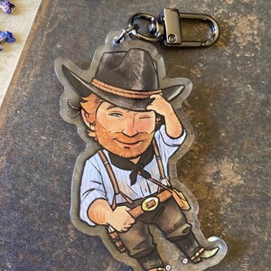 RESERVA Llavero acrílico con dije de Arthur Morgan de Red Dead Redemption