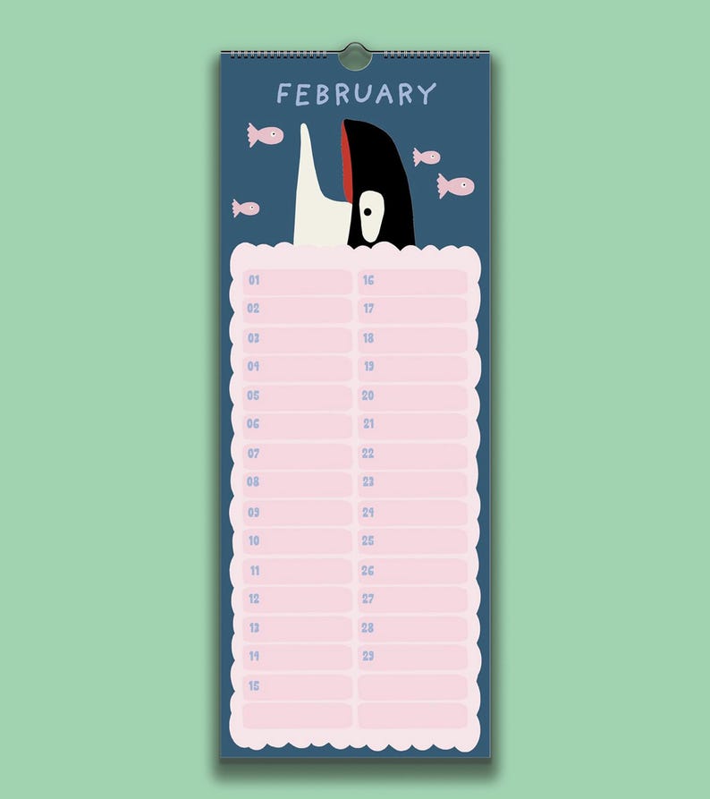 May include: A wall calendar for February featuring a dark blue background with a black and white orca illustration at the top, small pink fish, and a scalloped-edge light pink grid with numbered rows from 01 to 29 for daily planning entries.