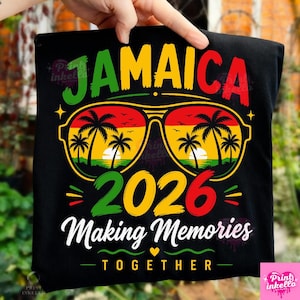 May include: Black t-shirt with a colorful graphic design featuring the word "JAMAICA" in green and red, sunglasses with palm trees, the year "2026", and the phrase "Making Memories Together."