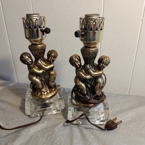 Coppia lampade da tavolo vintage in metallo Cherubino
