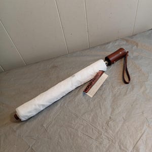 NOS Raines White Folding Umbrella