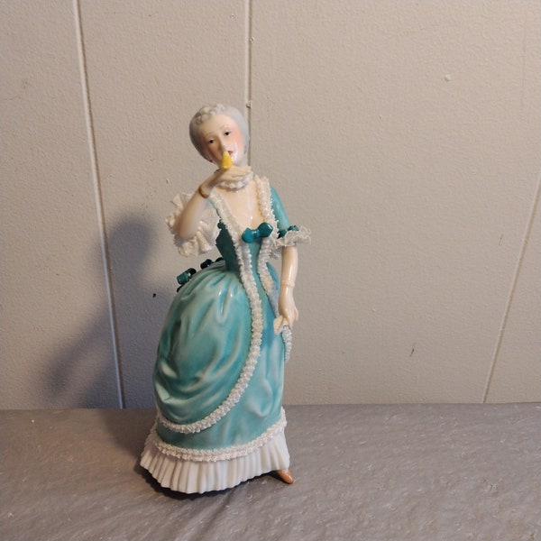 9" 1985 FP Porcelain Lady Figure Holding Bird with Lace Trim, A song for Gabrielle