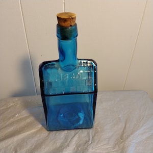 E.C. Booz&#39;s Old Cabin Whiskey Bottle, Blue House Shape Bottle