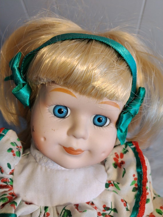 Porcelain doll with blonde hair cheap and blue eyes