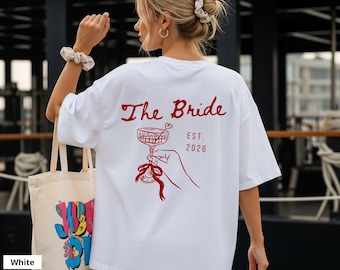 JGA Shirt Frauen - Personalisiert mit Name und Est. Datum, Junggesellinnenabschied TShirt, Champagner, Schleife, The Bride & The Bride Club