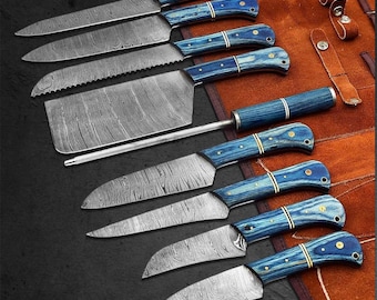May include: A set of eight kitchen knives with blue wooden handles and silver blades. The blades have a unique pattern. The set includes a cleaver, a serrated knife, and a sharpening steel. The knives are displayed on a brown leather roll.