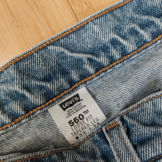 90s Levis 560 Red Tab Tapered Loose Fit 33 - image 9