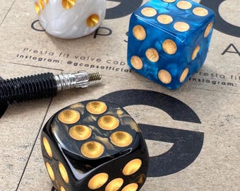 Dice valve caps. Presta fit. Three colours to choose from.
