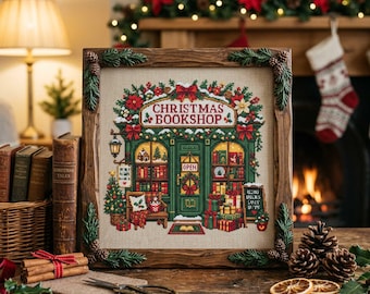 May include: A square cross-stitch embroidery depicting a Christmas bookshop, framed in a dark wood frame with pinecone and evergreen accents. The design features a green storefront, festive decorations, wrapped gifts, and the text Christmas Bookshop.