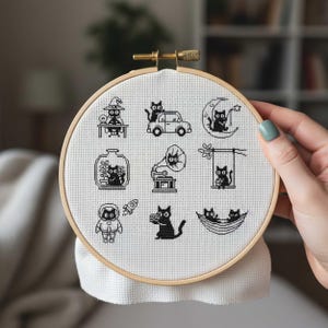This fantasy cross-stitch pattern features a hobbit-style cottage illustrated across all four seasons, each framed within a decorative postage stamp border. Spring blooms with soft flowers and gentle sunlight, summer glows with lush greenery, autumn warms the scene with golden leaves, and winter settles into a peaceful snowfall beneath a glowing moon. The rounded door, grassy roof, and winding path tie each scene together, creating a cohesive yet varied seasonal collection.