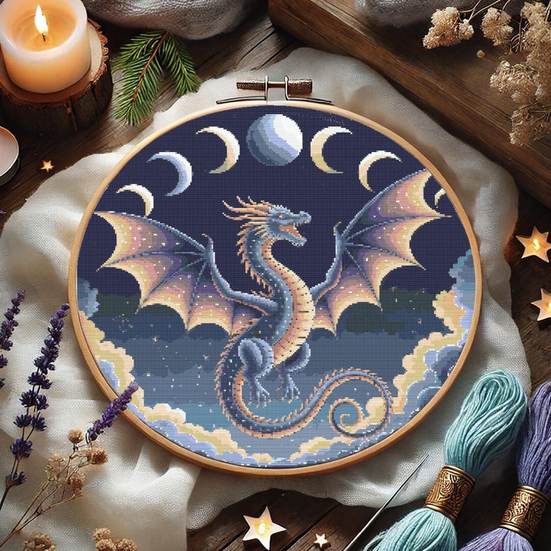 Mystical Lunar Dragon Embroidery Chart – DIY Fantasy Needlework
Immerse yourself in a world of cosmic wonder with this stunning celestial dragon embroidery pattern. With intricate shading, glowing moon phases, and a powerful dragon silhouette, this PDF cross-stitch chart is ideal for fantasy-inspired stitching and unique home decor.