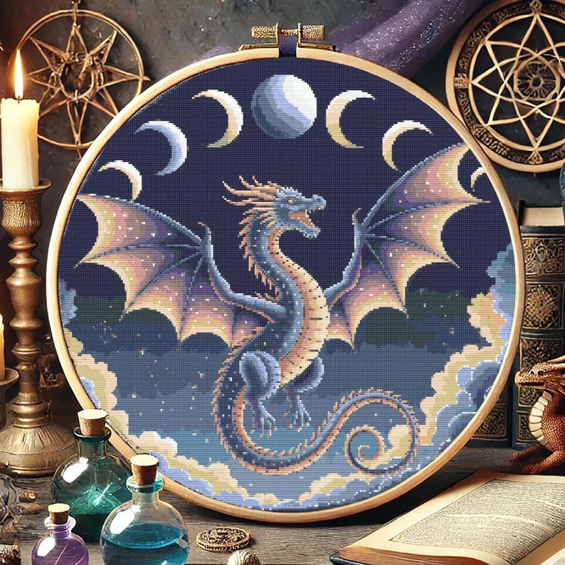 Celestial Dragon Cross-Stitch Pattern – Instant Download
Unleash the power of the stars with this Celestial Dragon Cross-Stitch Pattern! Featuring a majestic dragon soaring through a cosmic sky, surrounded by lunar phases and constellations, this intricate fantasy embroidery is perfect for mythical art lovers and celestial decor enthusiasts. Instantly downloadable for an easy and magical stitching experience!