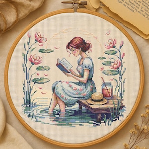 Peaceful Girl Reading by Water Cross Stitch Pattern Woman Reading Garden Embroidery Summer Reading Scene Floral Cross Stitch For Book Lovers