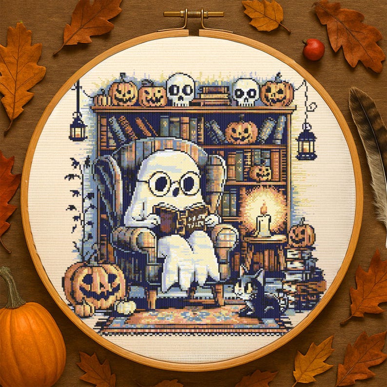 Ghost Reading in Haunted Library Cross-Stitch Pattern – Cozy Ghost with Glasses in Armchair Surrounded by Books, Pumpkins, Skulls and Candles for Halloween Decor
This charming Halloween cross-stitch design features a sweet ghost nestled in an armchair reading Ghost Tales. The cozy haunted library setting is rich with spooky details – pumpkins grin from bookshelves, skulls rest on top of ancient tomes, and glowing candles light the room. A curious cat peers up from below