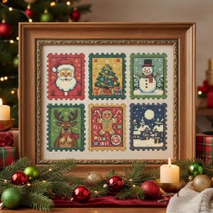 May include: A framed cross-stitch sampler with six festive Christmas stamp designs. The stamps showcase Santa Claus, a Christmas tree, a snowman, a reindeer, a gingerbread man, and a snowy village. The frame is a warm, brown colour.