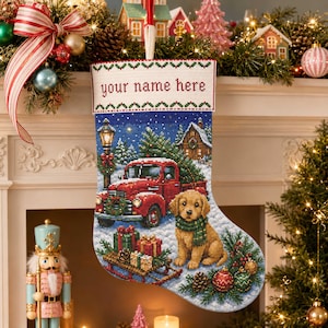 May include: A needlepoint Christmas stocking featuring a red vintage truck carrying a Christmas tree, a golden retriever puppy wearing a green scarf, and a sled with gifts. The white cuff has the text your name here in red embroidery.