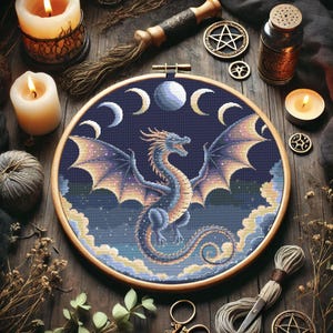 Celestial Dragon Cross-Stitch Pattern – Instant Download
Unleash the power of the stars with this Celestial Dragon Cross-Stitch Pattern! Featuring a majestic dragon soaring through a cosmic sky, surrounded by lunar phases and constellations, this intricate fantasy embroidery is perfect for mythical art lovers and celestial decor enthusiasts. Instantly downloadable for an easy and magical stitching experience!