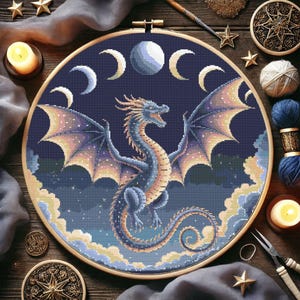 Mystical Lunar Dragon Embroidery Chart – DIY Fantasy Needlework
Immerse yourself in a world of cosmic wonder with this stunning celestial dragon embroidery pattern. With intricate shading, glowing moon phases, and a powerful dragon silhouette, this PDF cross-stitch chart is ideal for fantasy-inspired stitching and unique home decor.
