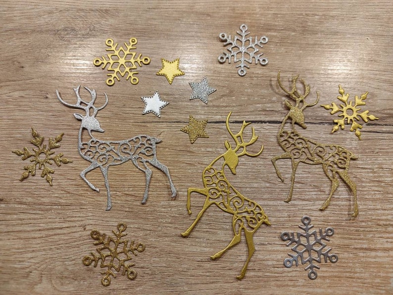 snowflakes, reindeer and, stars gold confetti Winter Wedding Table Decorations