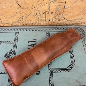 Bottle Steel Shot Filled Leather Paperweight