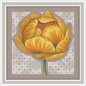 May include: A cross-stitch pattern featuring a single yellow flower with a detailed design. The flower is surrounded by a white geometric pattern on a beige background.