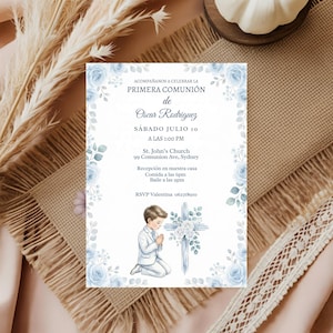May include: A First Communion invitation with a blue floral border. The invitation includes the text "ACOMPAÑANOS A CELEBRAR LA PRIMERA COMUNIÓN de Oscar Rodriguez" and event details. A watercolor illustration of a boy praying is featured.